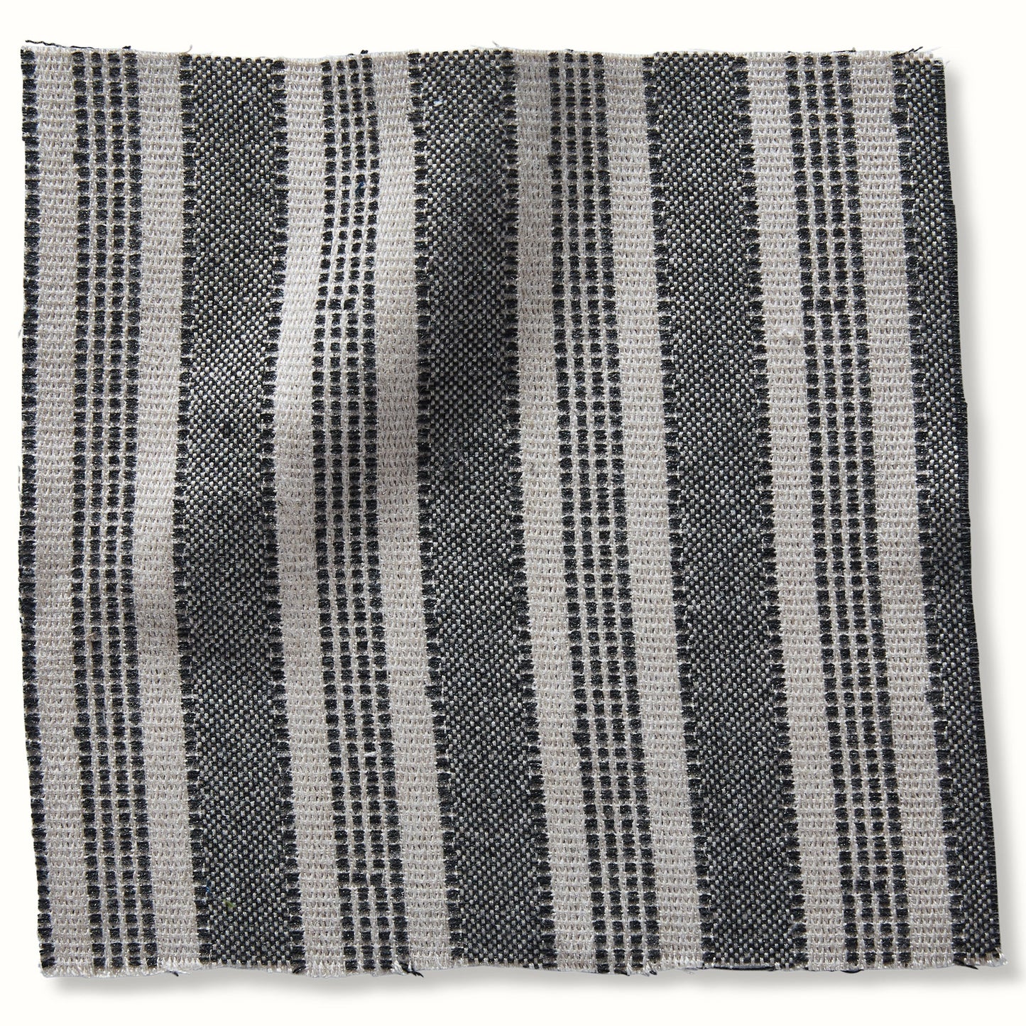 Pouf intérieur/extérieur en Amida Anthracite sur fond naturel de Peter Dunham Textiles