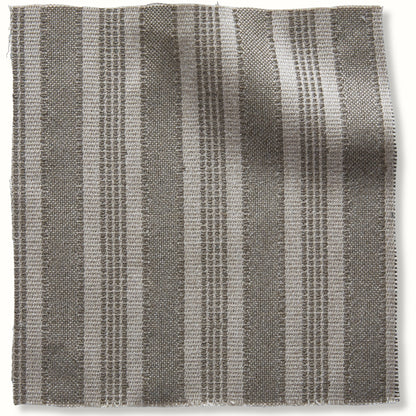Pouf intérieur/extérieur en pierre Amida de Peter Dunham Textiles sur fond naturel