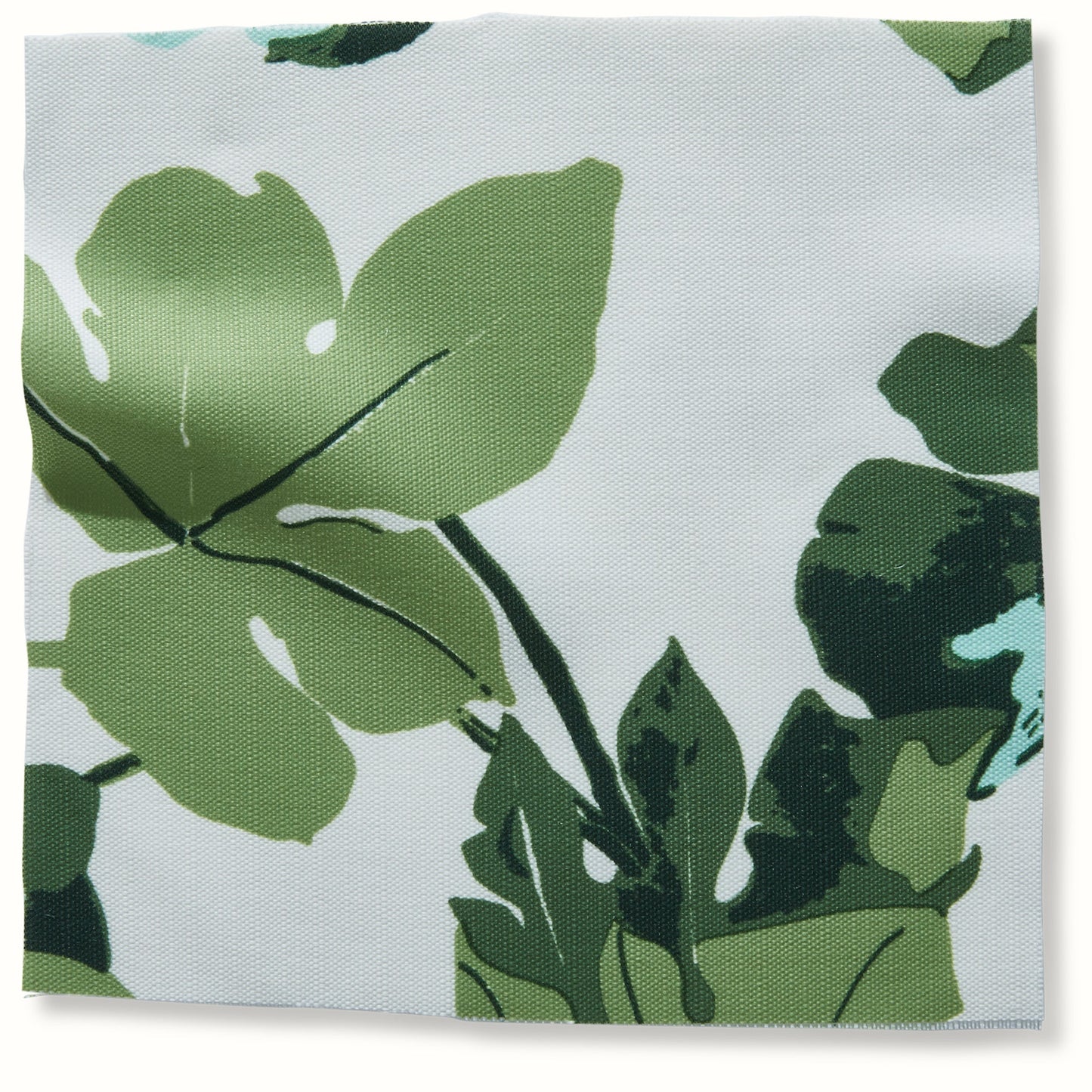 Pouf intérieur/extérieur en Peter Dunham Textiles, motif feuille de figue original sur fond blanc