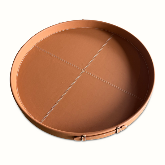Plateau rond en cuir cousu bleu et selle