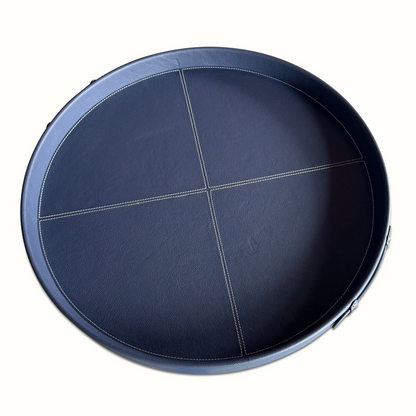 Plateau rond en cuir cousu bleu et selle