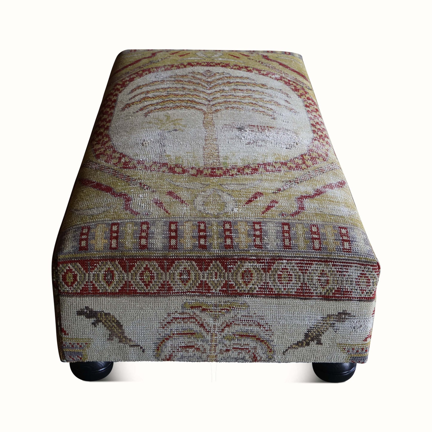 Pouf rembourré dans un tapis Khotan antique du XIXe siècle
