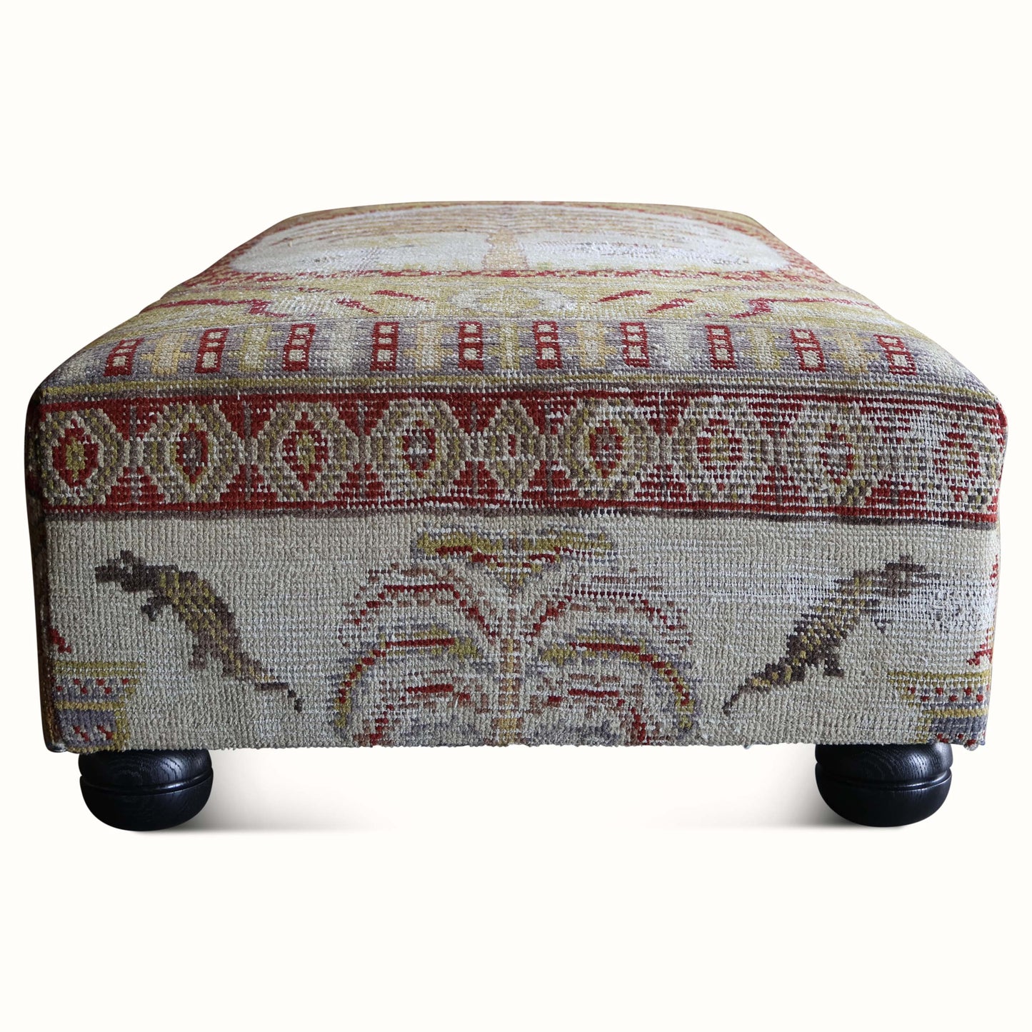 Pouf rembourré dans un tapis Khotan antique du XIXe siècle