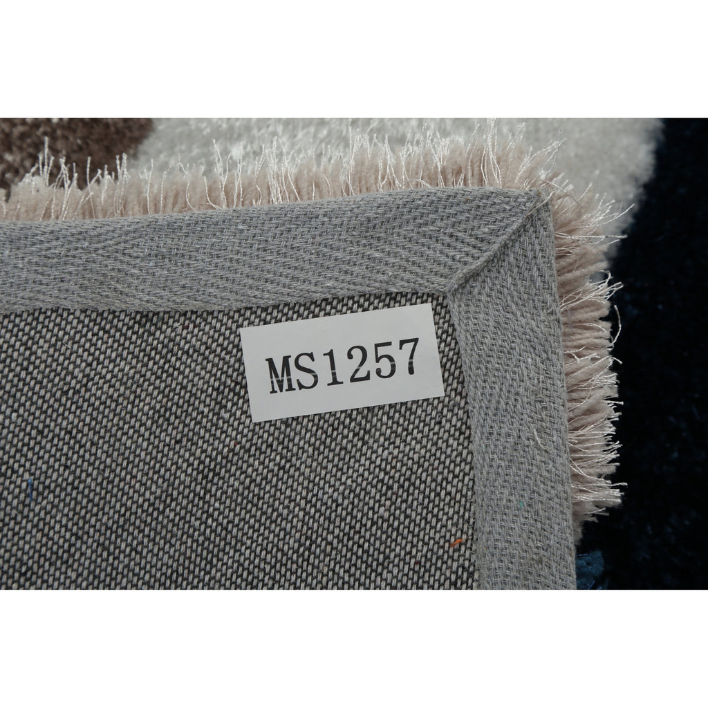 Tapis à poils longs Mateos au design abstrait