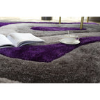 Tapis à poils longs Mateos au design abstrait