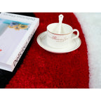 Tapis à poils longs Mateos au design abstrait