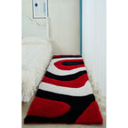 Tapis à poils longs Mateos au design abstrait