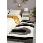 Tapis à poils longs Mateos au design abstrait