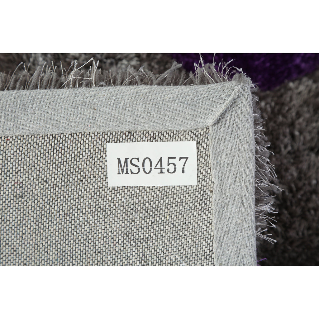 Tapis à poils longs Mateos au design abstrait