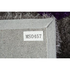 Tapis à poils longs Mateos au design abstrait